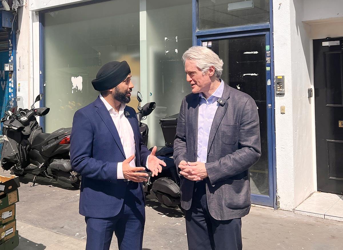 H&F Deputy Leader Cllr Ben Coleman with new Fulham postmaster Ajinder Kapoor. The post office will open in North End Road in June.