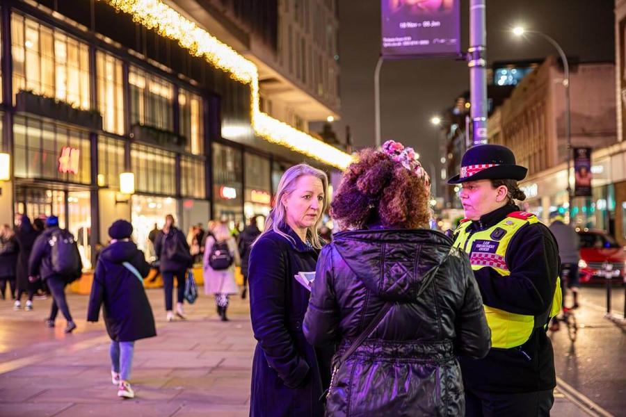 Cllr Rebecca Harvey (left) speaking to residents outside Livat shopping mall, Hammersmith, with H&F's Law Enforcement Team