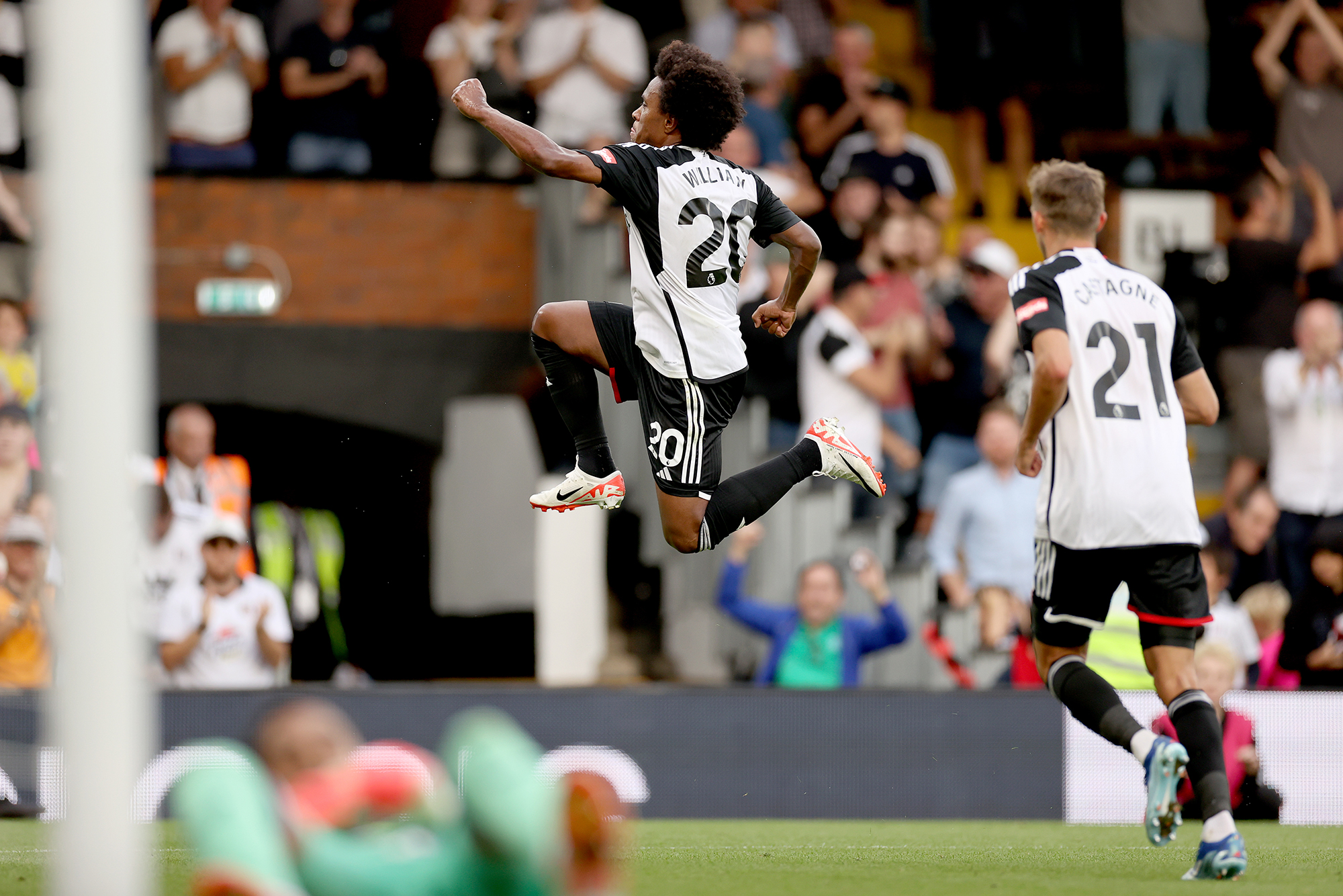 Willian celebrates scoring Fulham's third goal against Sheffield United