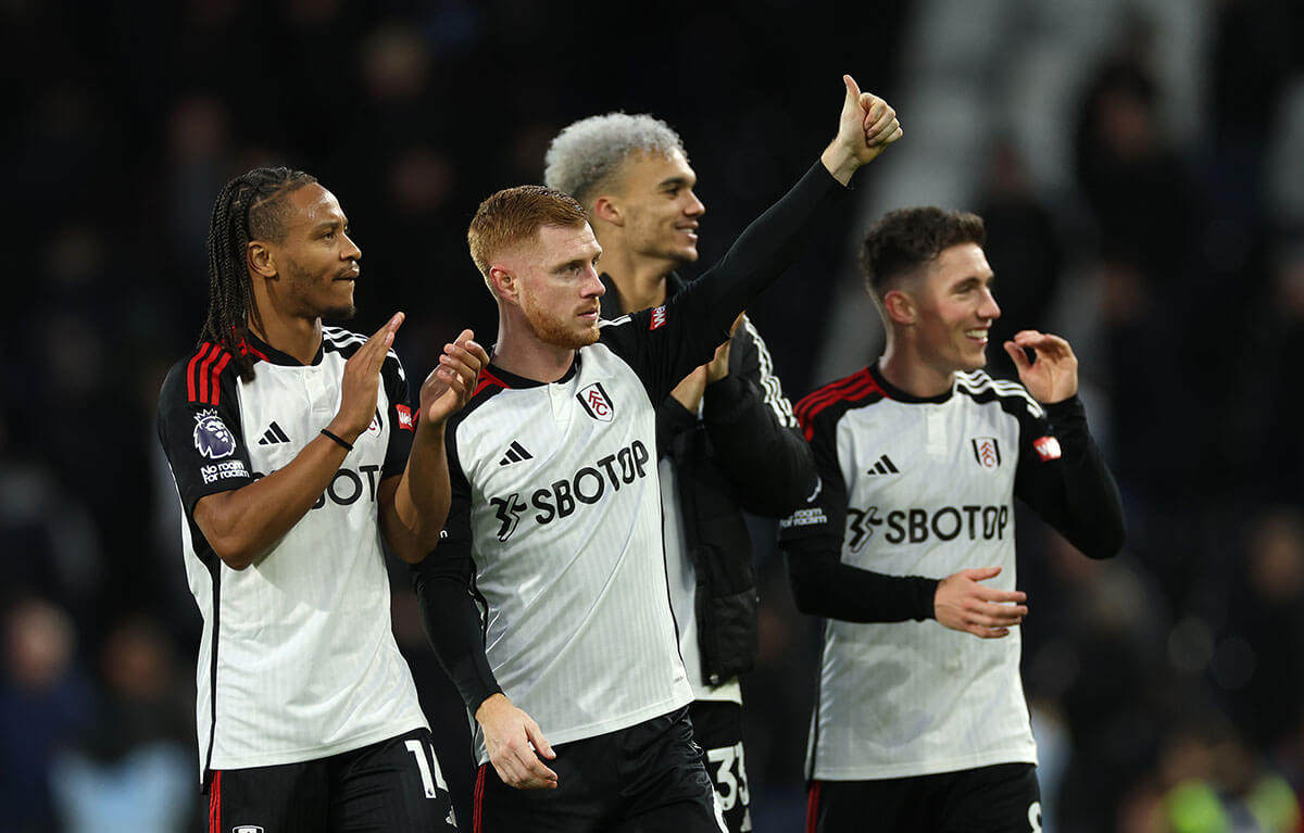 Bobby Reid and Harrison Reed of Fulham acknowledge the fans after Fulham's 5-0 victory against West Ham