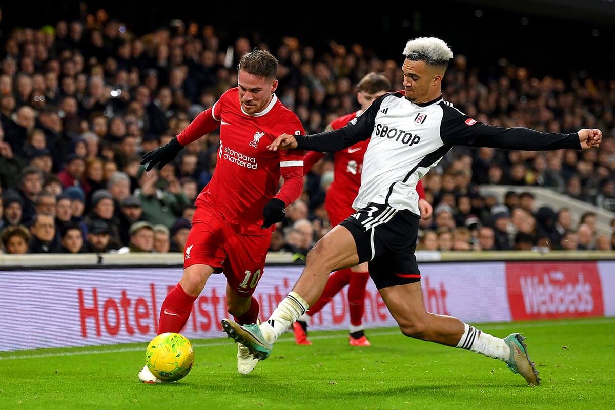 Fulham's Joao Palhinha (right) challenges Liverpool's Ryan Gravenberch at Craven Cottage
