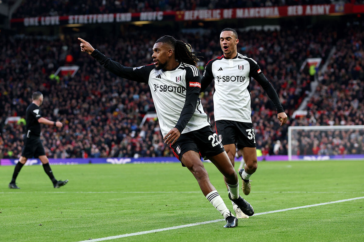 Alex Iwobi (left) celebrates scoring Fulham's winning goal against United at 96:04, the second latest winning goal against United in the Premier League