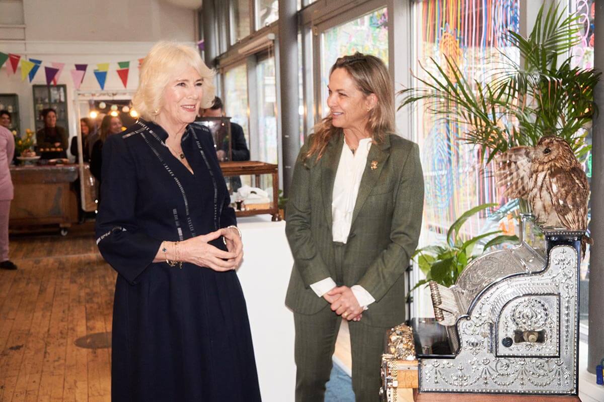 Queen Camilla with artist Cordelia Plunket (right) at Kindred Studios