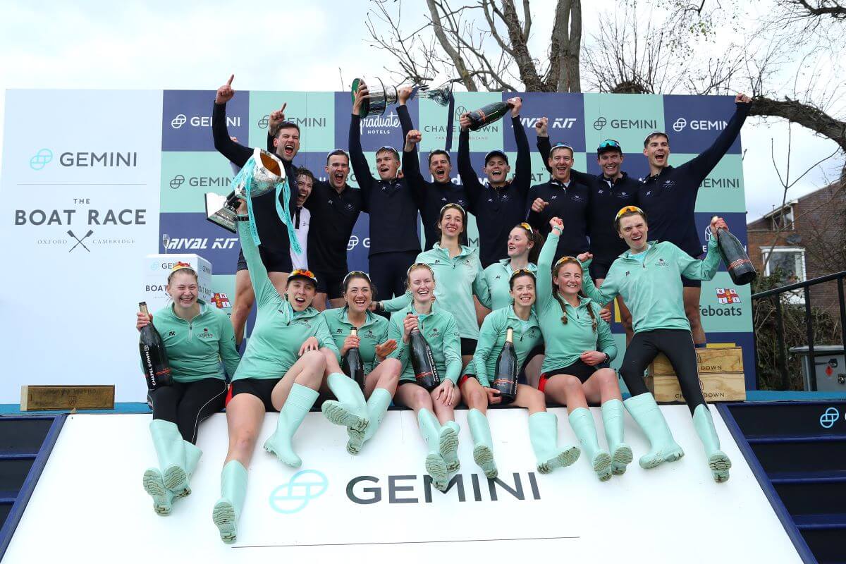 Cambridge University Women's Boat Club and Oxford University Men's Boat Club celebrate after their victories in The Gemini Boat Race 2022.