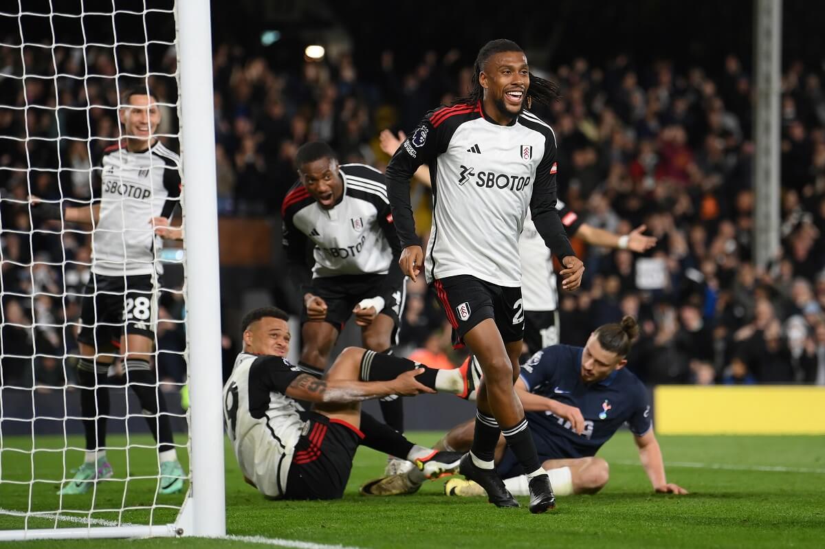  Alex Iwobi of Fulham celebrates Fulham's second goal by team mate Rodrigo Muniz (on ground)