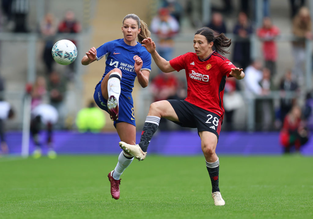 Melanie Leupolz of Chelsea battles for possession with Rachel Williams of Manchester United