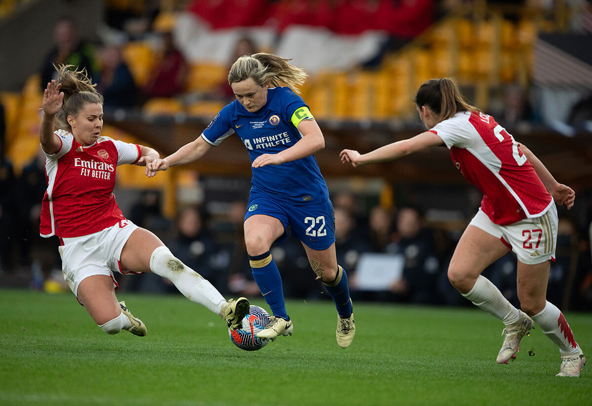 Victoria Pelova of Arsenal (left) tackles Chelsea's Erin Cuthbert (centre) in the League Cup final at Molineux