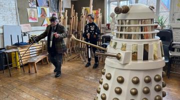 Sylvester McCoy (the seventh Doctor Who) and Sophie Aldred (Ace) re-enacting iconic scenes at the Macbeth Centre.