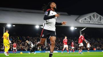 Alex Iwobi celebrates scoring Fulham's fourth goal against Forest