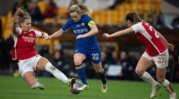 Victoria Pelova of Arsenal (left) tackles Chelsea's Erin Cuthbert (centre) in the League Cup final at Molineux