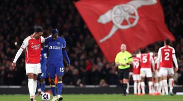 Arsenal defender Gabriel Magalhães consoles Nicolas Jackson after Arsenal's 4th goal