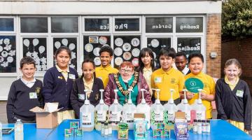 H&F Mayor Cllr Patricia Quigley (centre) joined students at the Refill Stop unveiling at St John XXIII Catholic Primary School