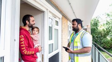 A surveyor from Ridge and Partners LLP visiting an H&F resident
