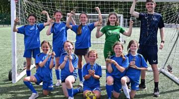 St Peter’s, winners of the girls’ half of the annual Mayor’s Cup, with team coach Jake Webb (far right)