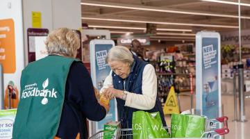 H&F Foodbank volunteer collecting donations at Sainsbury's in Imperial Wharf