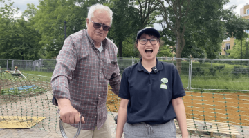 A resident with a volunteer from Hammersmith Garden Community Association