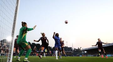 Kadeisha Buchanan competes for the ball against Villa's Lucy Staniforth