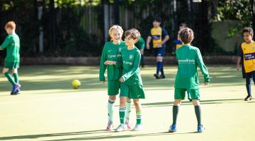 All Saints boys team celebrate scoring against St Pauls.