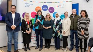 L-R: H&F's Deputy Mayor Daryl Brown (second from the left), Deputy Leader of H&F Cllr Alex Sanderson (middle) with interpreting student Natalia Morozova (third from right) and other learners.