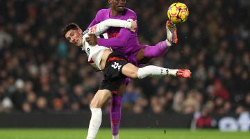 Harry Wilson battles with Toti Gomes