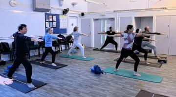 Donna Peart (middle) teaching a Hatha Yoga class