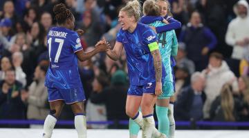 Sandy Baltimore (left) celebrates beating Man City with Millie Bright (right)