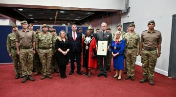 Number 17 Company stand with Cllr Sanderson (left), Cllr Cowan (centre left), Cllr Holder (centre), Major Rudy Vandaele-Kennedy (centre right) and Cllr Brown (right)