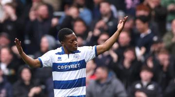 Karamoko Dembele celebrates scoring a goal against Swansea City