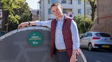 Cllr Rowan Ree, H&F Cabinet Member for Finance and Reform with investor funded cycle hangar in Findon Road, Shepherds Bush