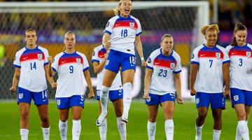Chloe Kelly and her teammates celebrate during the shootout.