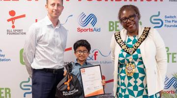 Ivaan Chakraborty (centre) with Cllr Sharon Holder (right), Mayor of H&F