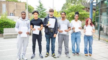 Students from Ark Burlington Danes collect their results