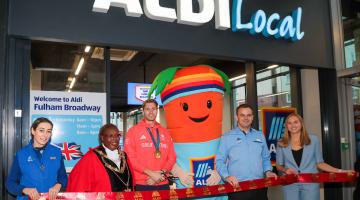 L-t-r (centre): H&F Mayor Cllr Sharon Holder and Olympic gold medallist Rory Gibbs join store manager David Murray for the unveiling of the new ALDI store in Fulham Broadway centre