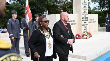H&F Mayor Sharon Holder at the Polish Air Force Memorial in South Ruislip, accompanied by her consort