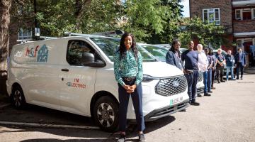 Cllr Frances Umeh with the housing repairs team and their new fleet of electric vans