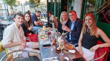 Residents eating outside at El Metro in Fulham