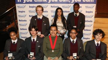 Students pose with their medals at the Jack Petchey awards