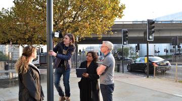 Research team install air quality monitor