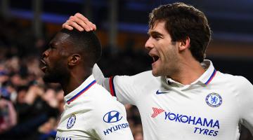 Fikayo Tomori celebrates scoring a goal with a team mate