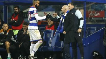 QPR's Sandro with manager Ian Holloway as he is substituted