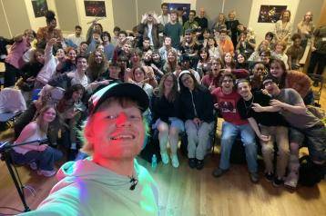 Ed Sheeran takes a selfie with staff and sixth formers at the Rhythm Studio