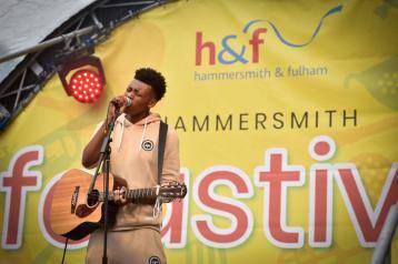 Performer on stage at Hammersmith summer street festival