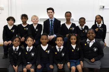 Fulham Primary head John Lynch (centre, back row) with school council members