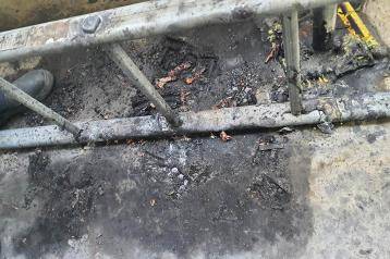 A converted e-bike caught fire on this balcony at the 18-storey Linacre Court in Hammersmith
