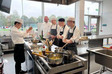 Chef Yoshihiko ‘Sushi Yoshi' Shida teaching students from North Hertfordshire