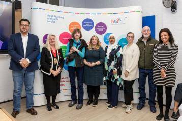 L-R: H&F's Deputy Mayor Daryl Brown (second from the left), Deputy Leader of H&F Cllr Alex Sanderson (middle) with interpreting student Natalia Morozova (third from right) and other learners.