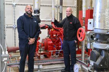 LFB Hammersmith Station Commander James Berry (right) and H&F Fire and Structural Safety Project Manager Dane Christie (left) at Woodford Court