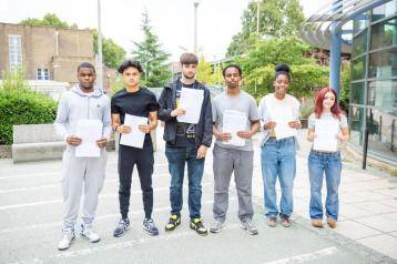 Students from Ark Burlington Danes collect their results
