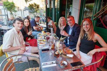 Residents eating outside at El Metro in Fulham