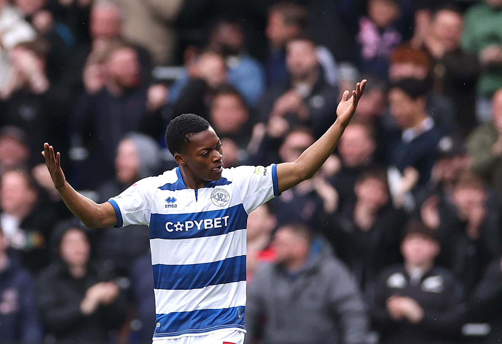 Karamoko Dembele celebrates scoring a goal against Swansea City